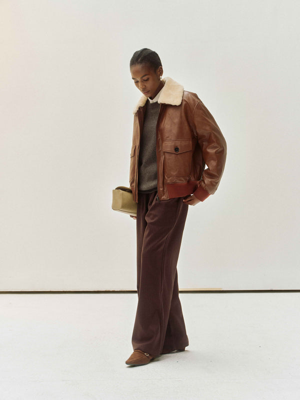 Giacca in pelle con collo in shearling