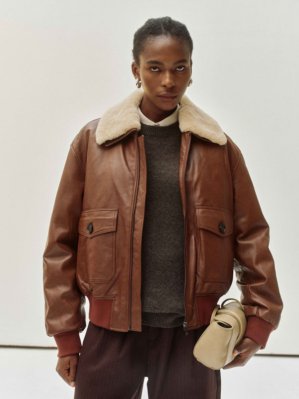 Giacca in pelle con collo in shearling