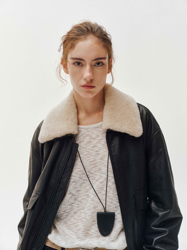 Giacca in pelle con collo in shearling