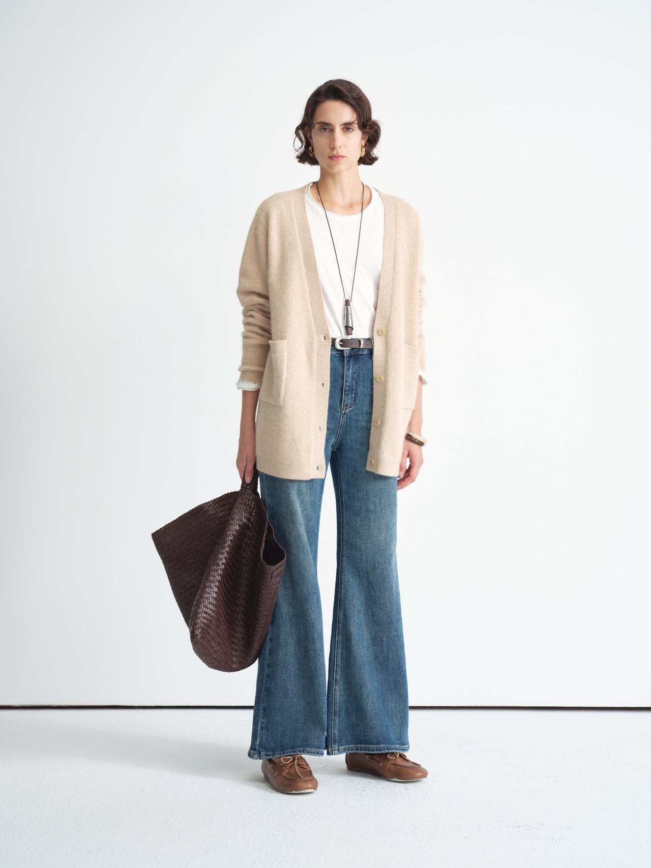 Jeans in denim a gamba larga