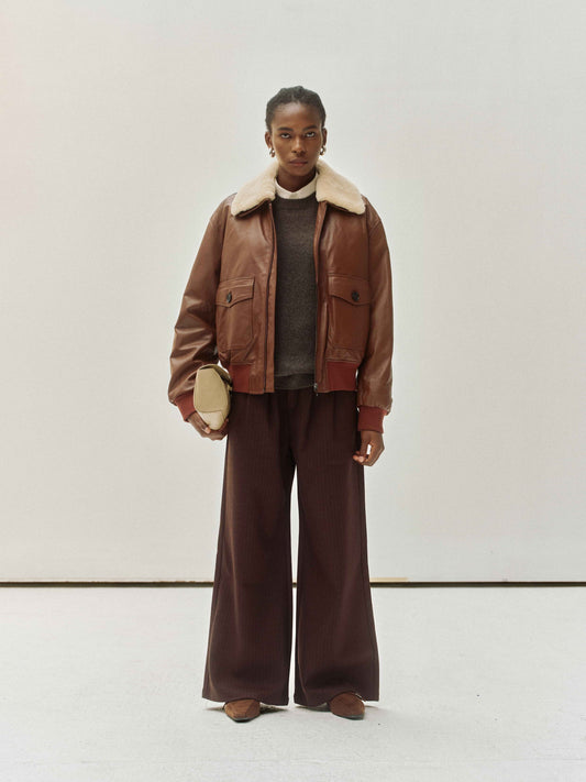 Giacca in pelle con collo in shearling
