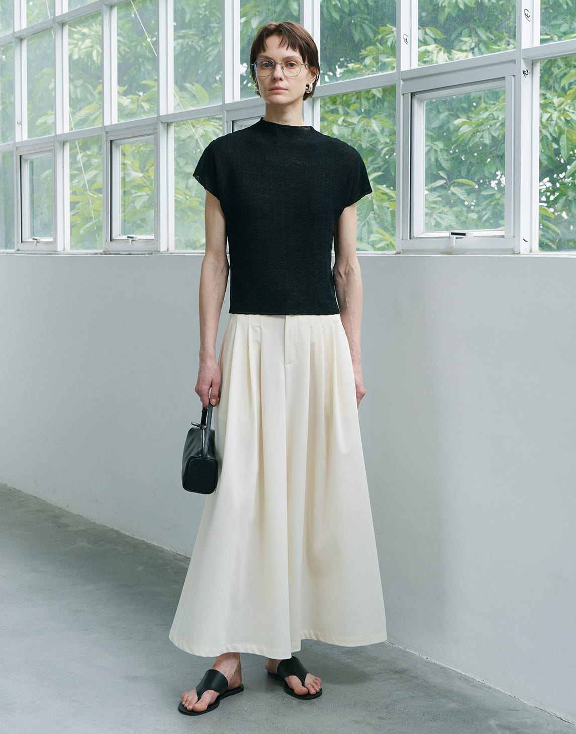 Elegante, plissierte Hosen mit weitem Bein