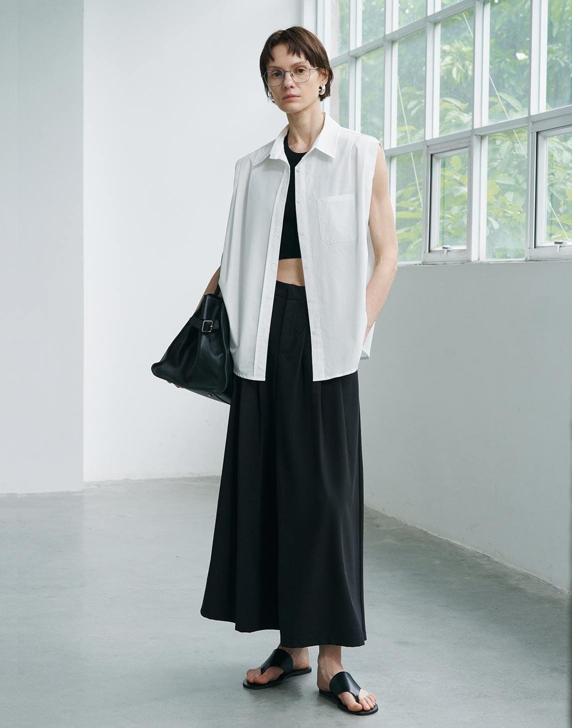 Elegante, plissierte Hosen mit weitem Bein