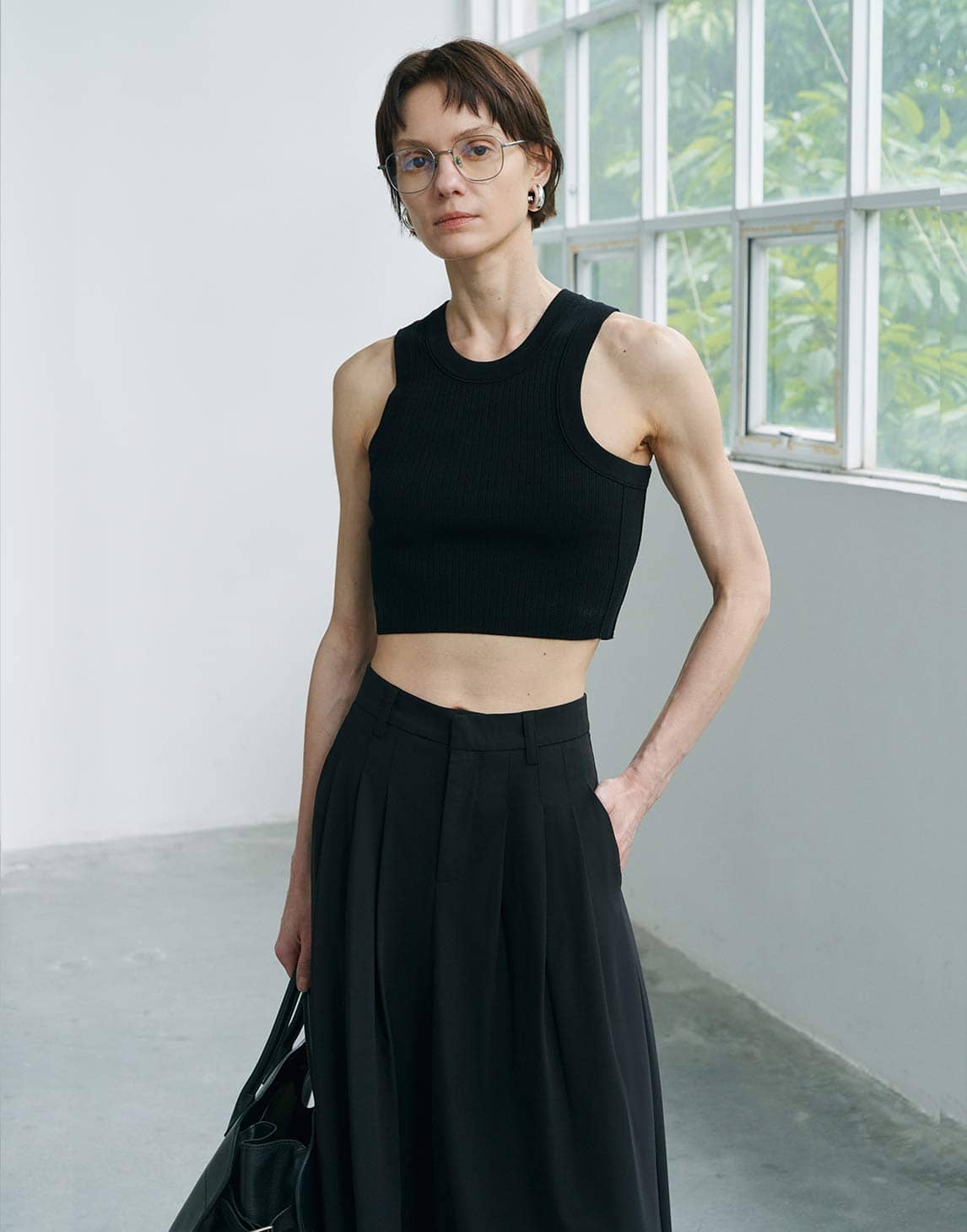 Elegante, plissierte Hosen mit weitem Bein