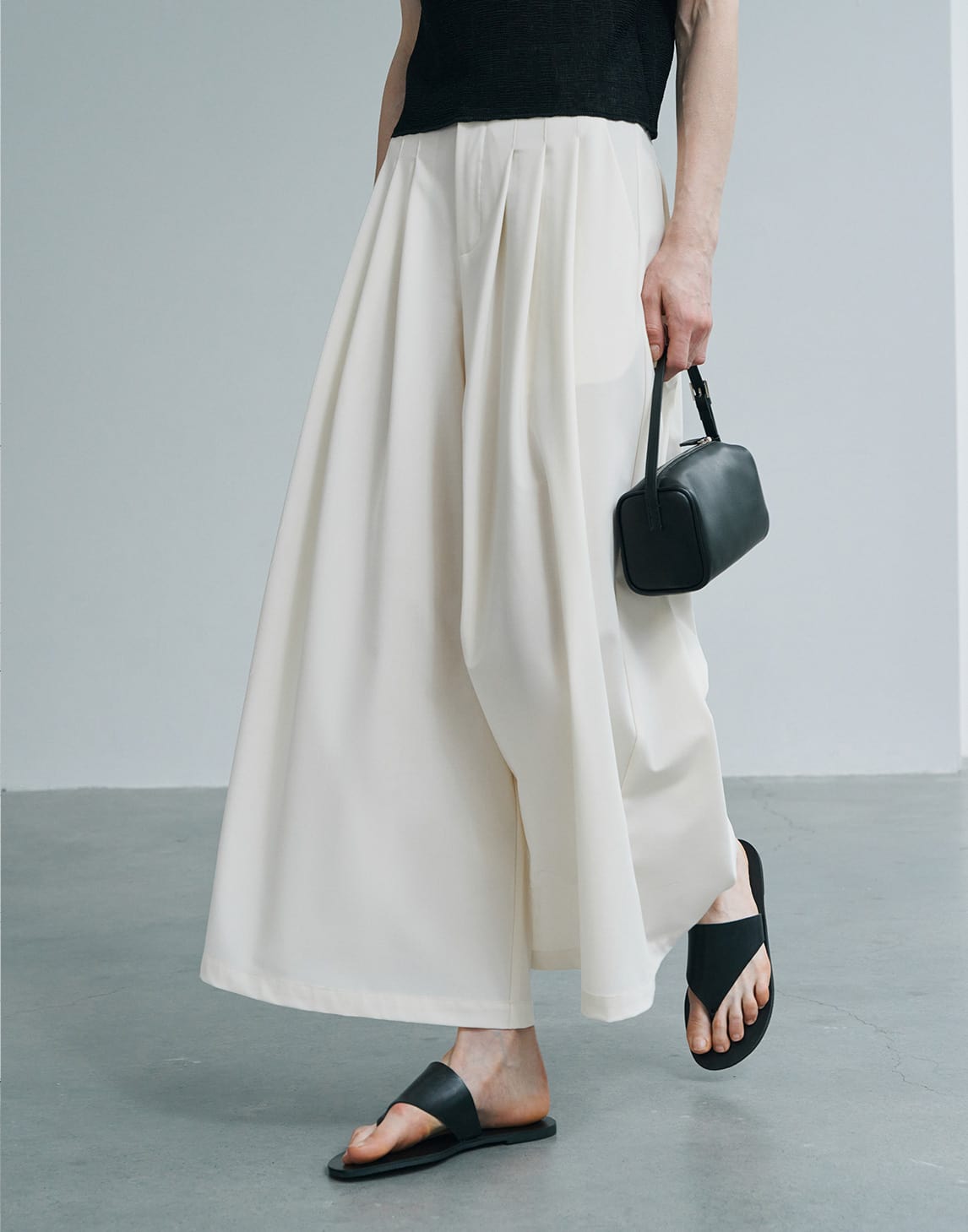 Elegante, plissierte Hosen mit weitem Bein
