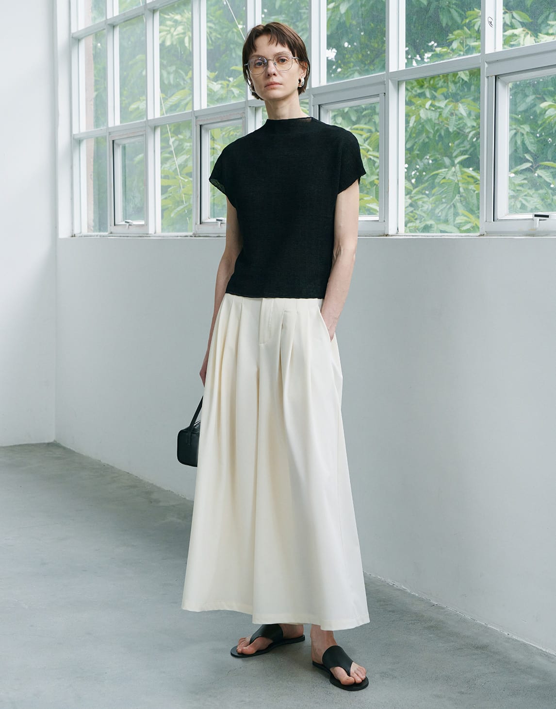 Elegante, plissierte Hosen mit weitem Bein