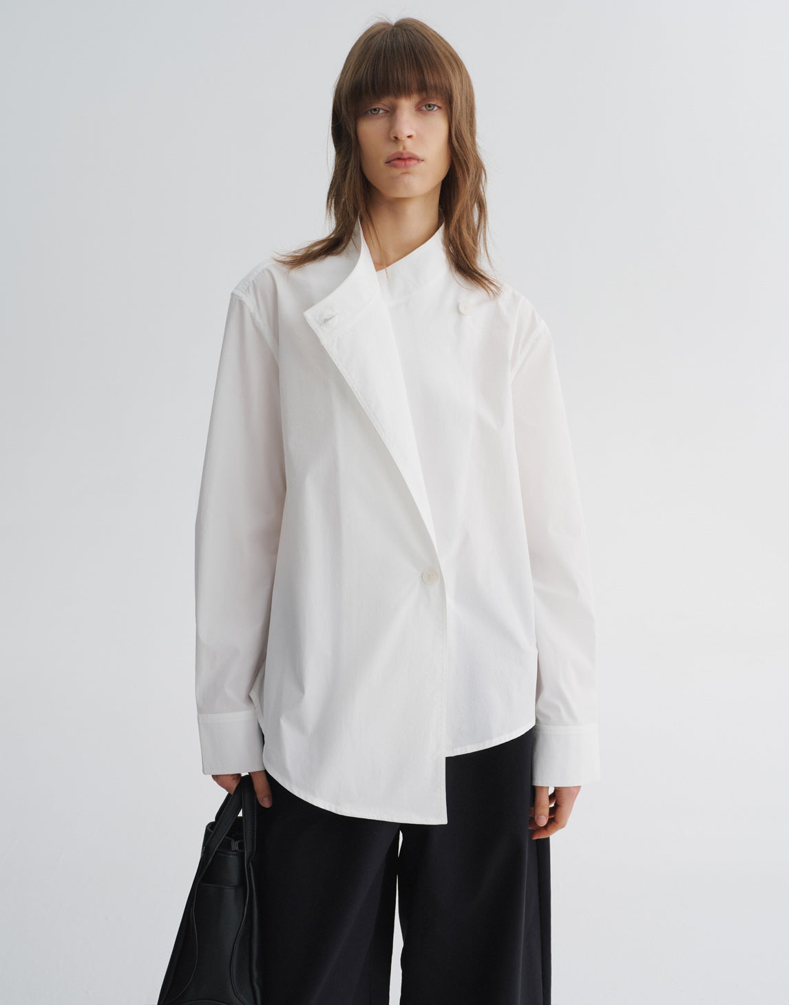 Blouse asymétrique à col en V croisé
