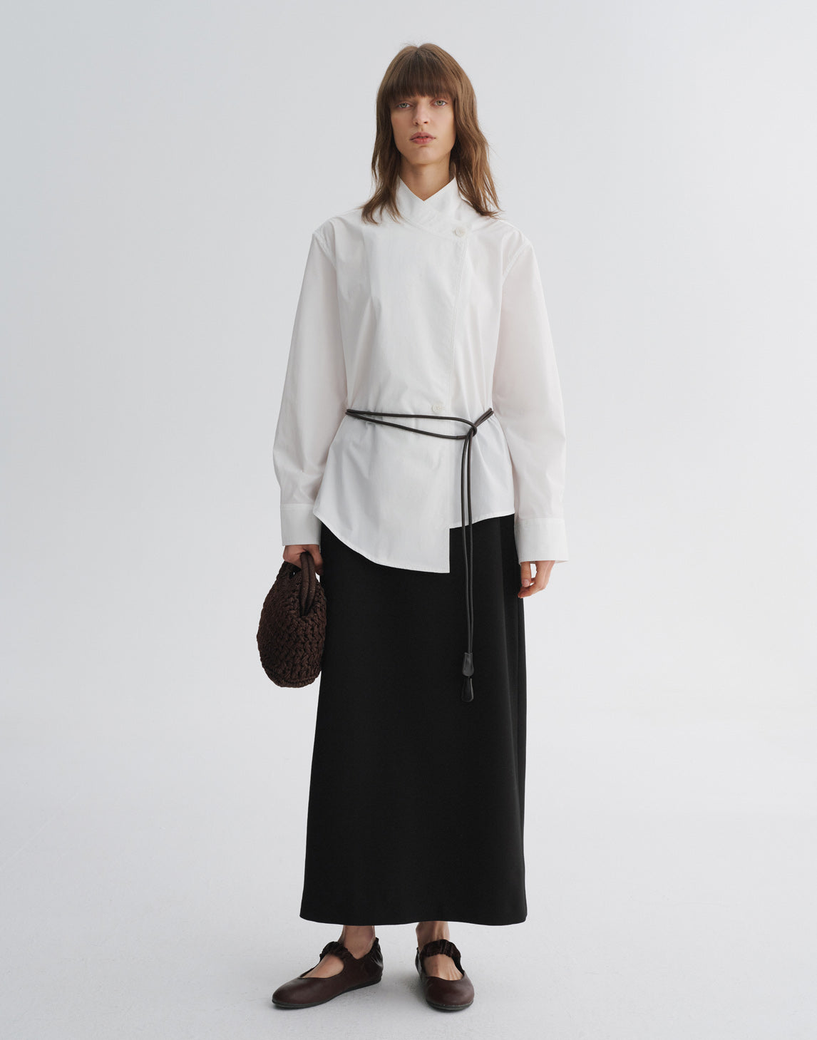 Blouse asymétrique à col en V croisé