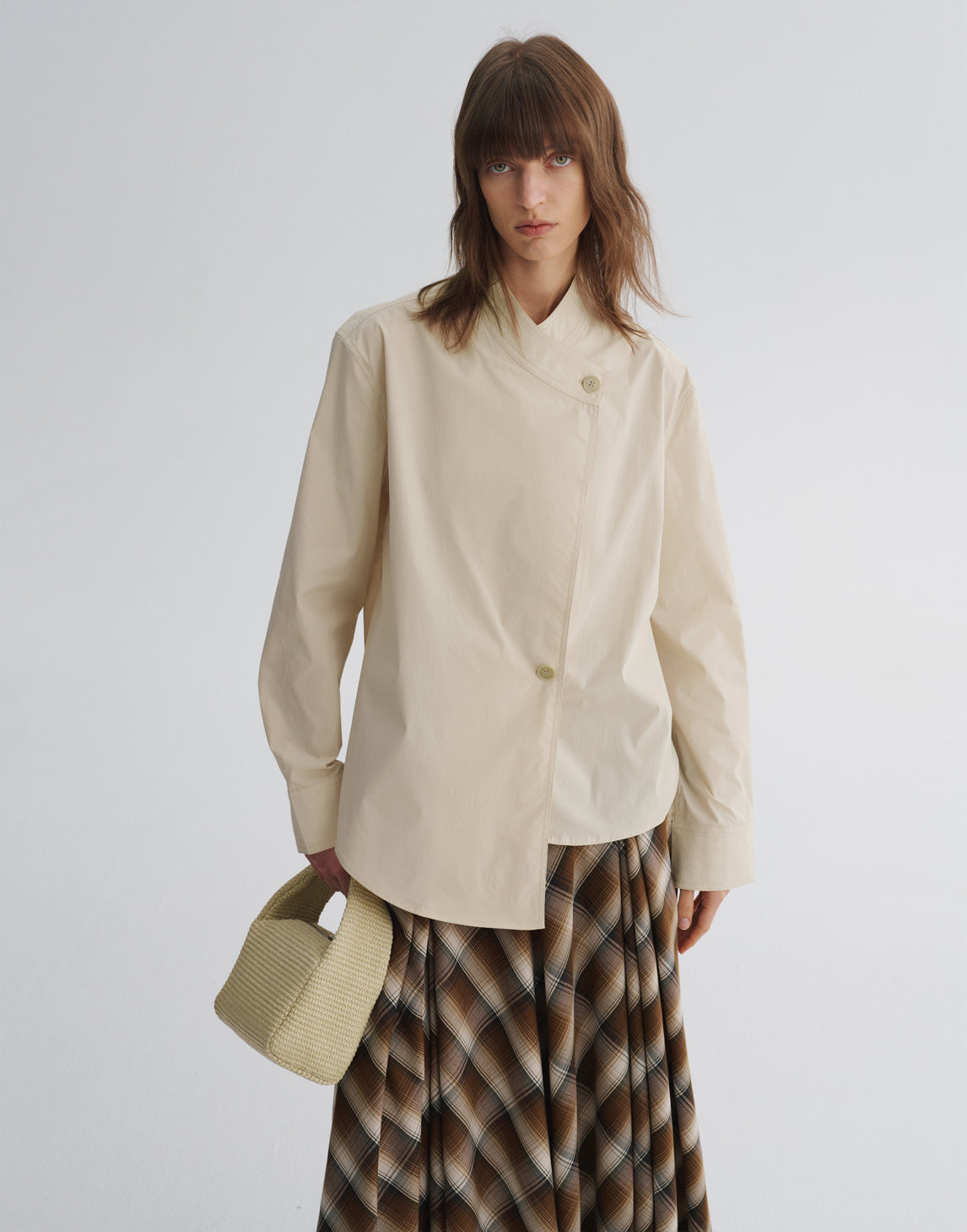 Blouse asymétrique à col en V croisé